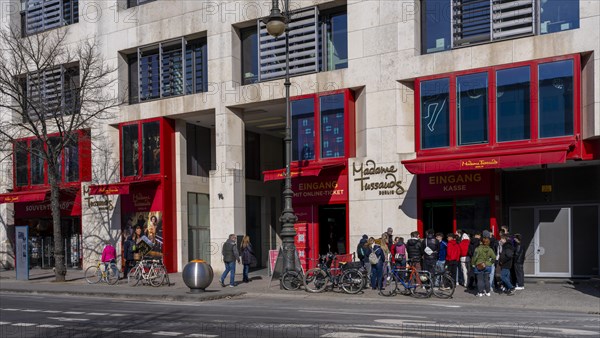 Group of tourists at the entrance to the Madame Tussauds wax museum, Unter den Linden, Berlin,