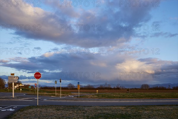 Weather change with mighty light to grey-blue clouds illuminated by the evening sun over the Black