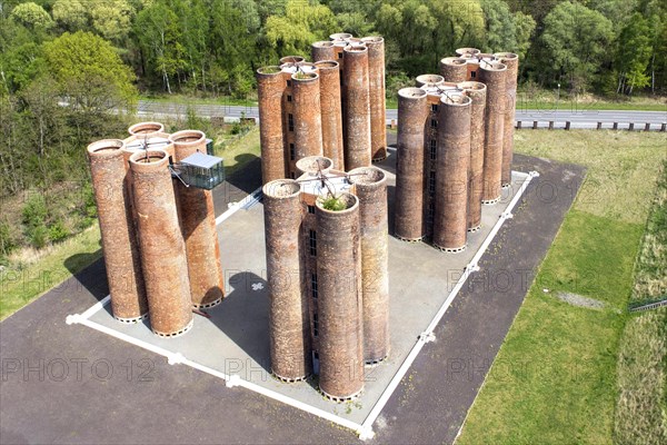 An aerial photo shows 24 brick towers rising 22 metres into the sky above Lauchhammer. They are the