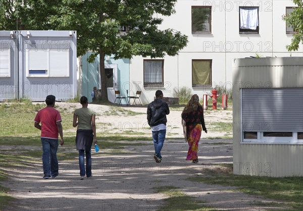 Refugees at the central contact point for asylum seekers in the state of Brandenburg in