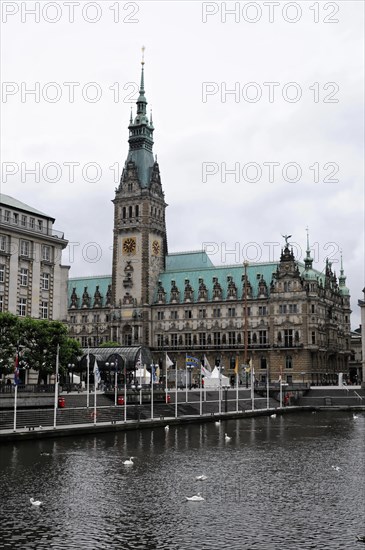 Hamburg City Hall with its impressive architecture and reflection in the water, Hamburg, Hanseatic
