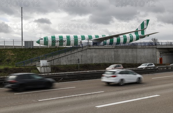An Airbus A330 Neo from Condor crosses a bridge next to the A3 motorway at Frankfurt Airport, 16.03