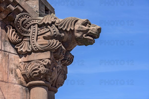 Gargoyle, demonic animal figure at the pavilion, historic Wilhelmine railway station, red