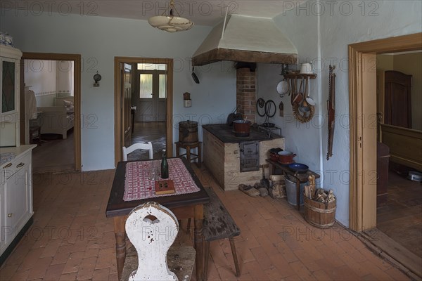 Kitchen with cooking area in a farmhouse from the 19th century, Open-Air Museum of Folklore