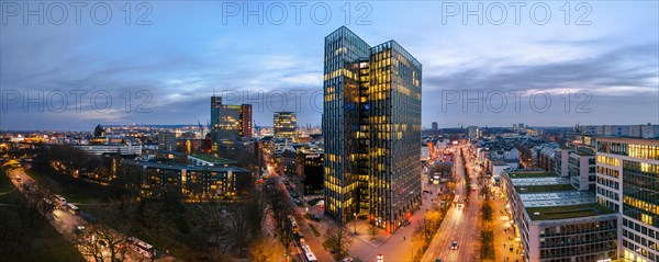 Panorama aerial view Dancing Towers at blue hour with Reeperbahn, St. Pauli, Hamburg, Germany,