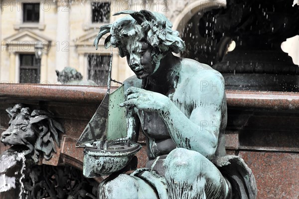 Close-up of a copper allegorical sculpture at a public fountain, Hamburg, Hanseatic City of
