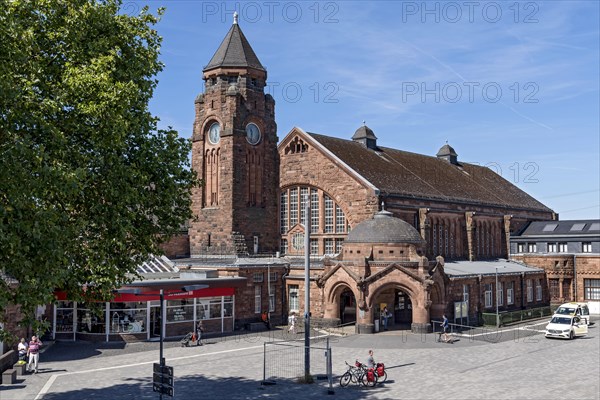 Historic Wilhelmine railway station, clock tower, pavilion with entrance to the station building,