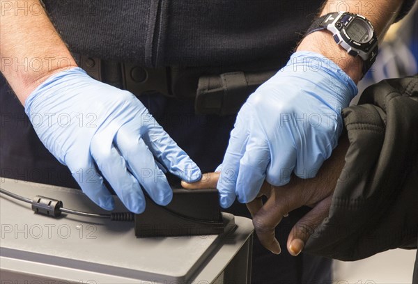 Refugees are registered and recorded by the Federal Police in Rosenheim. A Federal Police officer