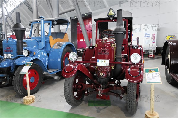 RETRO CLASSICS 2010, Stuttgart Trade Fair, Retro Lanz Bulldog in red colour presented in an