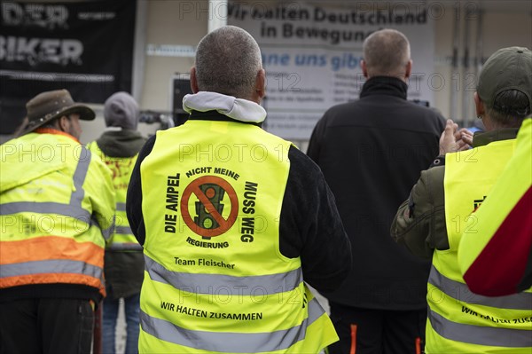 Demonstrators with printed high-visibility waistcoats, taken as part of the 'AeoeFarmers'