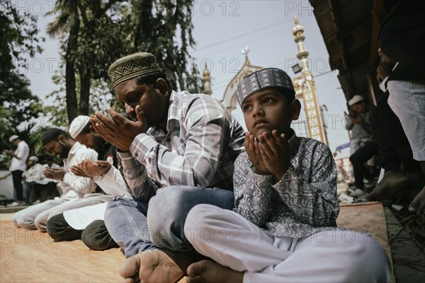 Muslim devotees offer the first Friday prayers of the holy month of Ramadan at a Mosque, on March