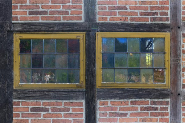 Colourful window panes of a 19th century smithy, Open-Air Museum of Folklore Schwerin-Muess,