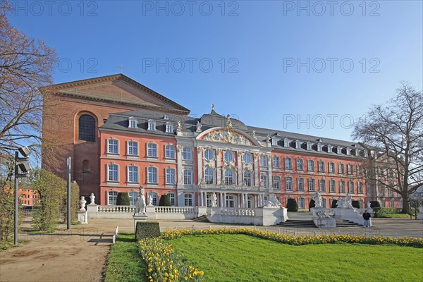 Electoral Palace and Constantine Basilica with palace garden in spring and daffodils, Trier,