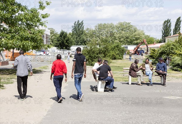 Refugees at the central contact point for asylum seekers in Brandenburg, Eisenhuettenstadt, 3 June