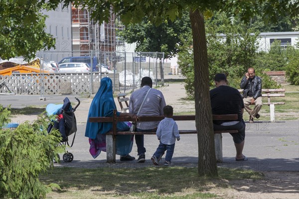 Refugees at the central contact point for asylum seekers in the state of Brandenburg in