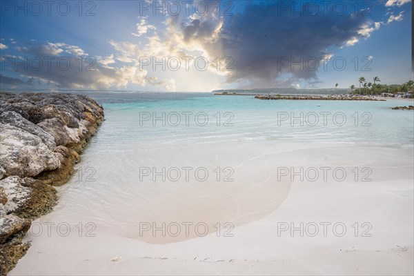 Caribbean dream beach with palm trees, white sandy beach and turquoise-coloured, crystal-clear