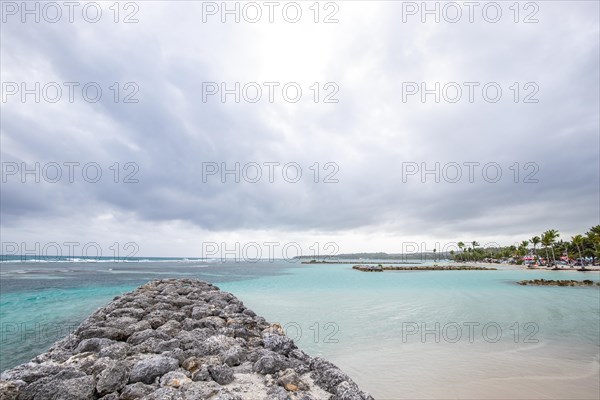 Caribbean dream beach with palm trees, white sandy beach and turquoise-coloured, crystal-clear