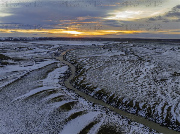 Overgrown river landscape, onset of winter, sunset, Fjallabak Nature Reserve, drone shot,
