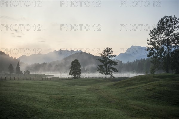 Sunrise and morning fog, Geroldsee or Wagenbruechsee, Kruen near Mittenwald, Werdenfelser Land,