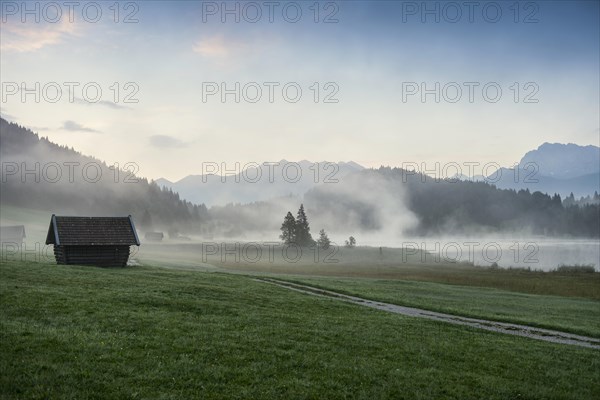 Sunrise and morning fog, Geroldsee or Wagenbruechsee, Kruen near Mittenwald, Werdenfelser Land,