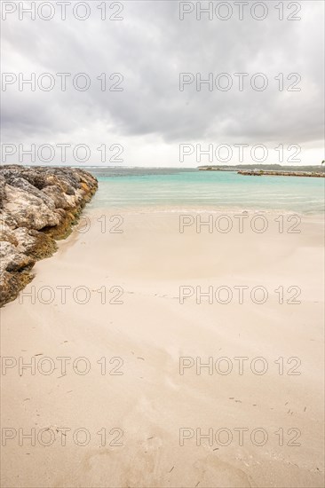 Caribbean dream beach with palm trees, white sandy beach and turquoise-coloured, crystal-clear