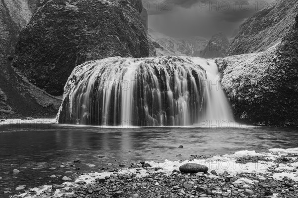 Stjornarfoss waterfall, near Kirkjubaejarklaustur, black and white photo, Sudurland, Iceland,