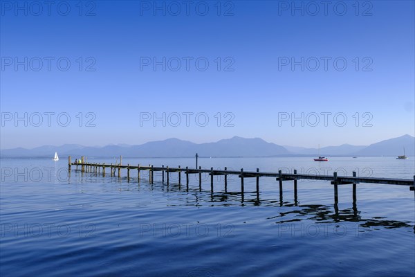 Lake Chiemsee with mountains from Hotel Malerwinkel, Chiemgau, Upper Bavaria, Bavaria, Germany,