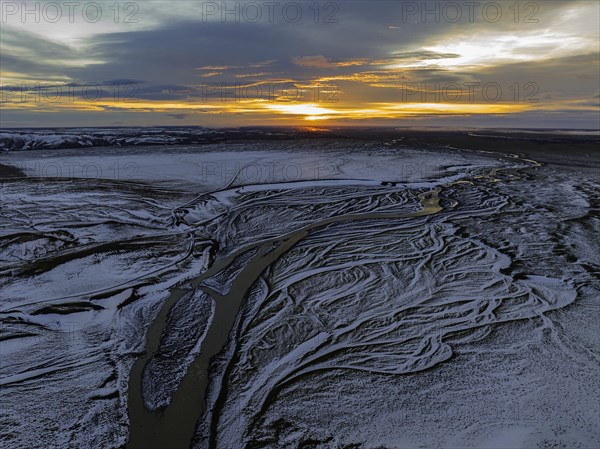 Overgrown river landscape, onset of winter, sunset, Fjallabak Nature Reserve, drone shot,
