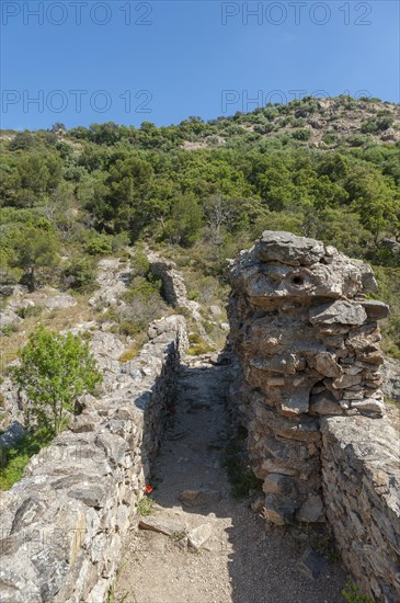 Historic arch bridge Le Pont des Fees with partially preserved water conduit, Grimaud-Village, Var,