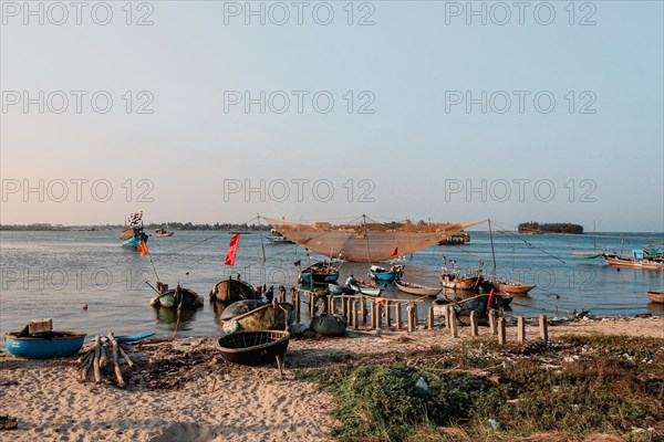 Scenic view of traditional Vietnamese fishing boats in Phan Thiet fishing village in Mui Ne,