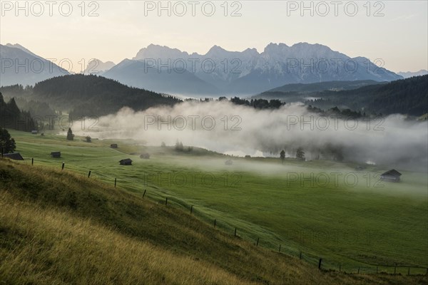 Sunrise and morning fog, Geroldsee or Wagenbruechsee, Kruen near Mittenwald, Werdenfelser Land,