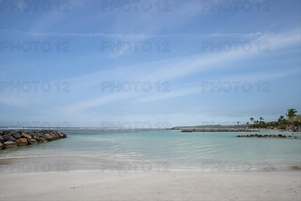 Caribbean dream beach with palm trees, white sandy beach and turquoise-coloured, crystal-clear