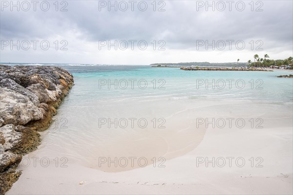 Caribbean dream beach with palm trees, white sandy beach and turquoise-coloured, crystal-clear
