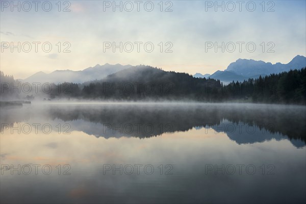 Sunrise and morning fog, Geroldsee or Wagenbruechsee, Kruen near Mittenwald, Werdenfelser Land,