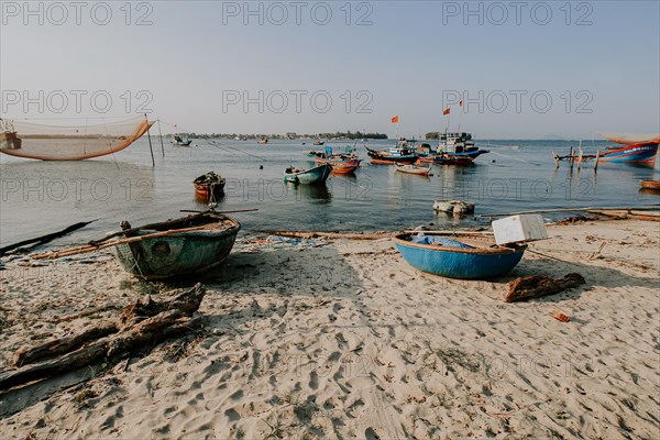 Scenic view of traditional Vietnamese fishing boats in Phan Thiet fishing village in Mui Ne,
