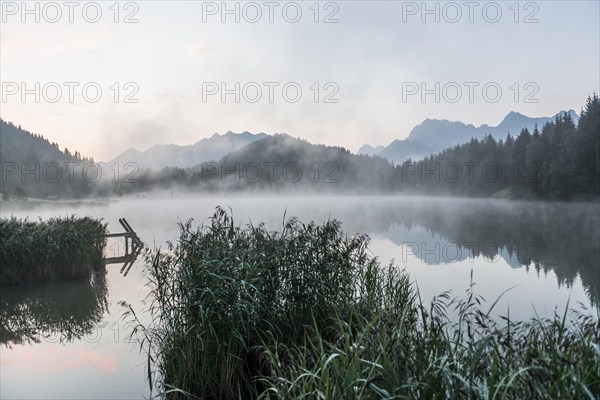 Sunrise and morning fog, Geroldsee or Wagenbruechsee, Kruen near Mittenwald, Werdenfelser Land,
