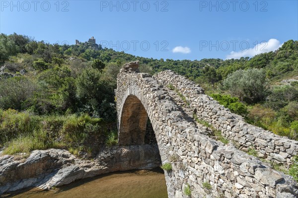 Historic arch bridge Le Pont des Fees over the river La Garde, Grimaud-Village, Var,