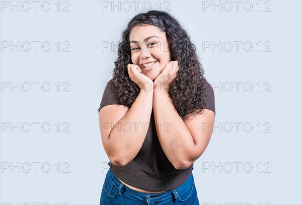 Happy girl face looking and smiling at the camera isolated. Portrait of beautiful girl smiling at