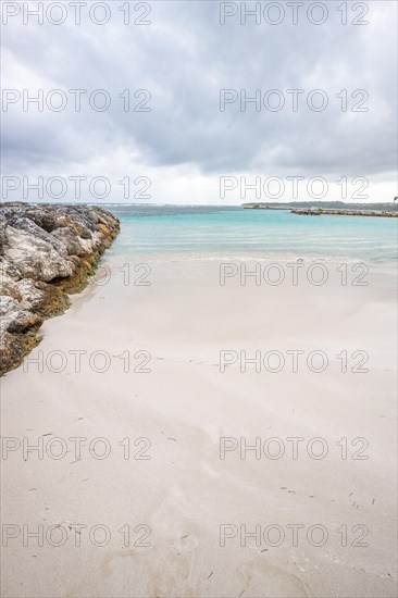Caribbean dream beach with palm trees, white sandy beach and turquoise-coloured, crystal-clear
