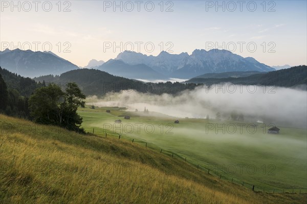 Sunrise and morning fog, Geroldsee or Wagenbruechsee, Kruen near Mittenwald, Werdenfelser Land,