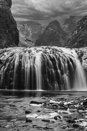 Stjornarfoss waterfall, near Kirkjubaejarklaustur, black and white photo, Sudurland, Iceland,