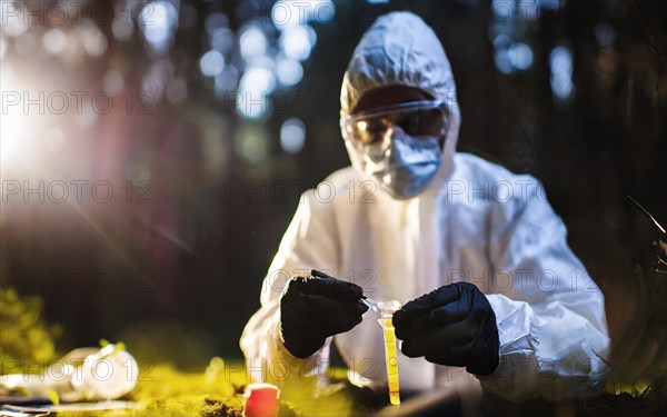 Securing evidence at a crime scene in the forest, KTU, forensic investigation by the criminal