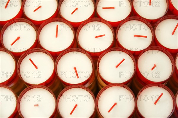 Church of Notre-Dame de la Garde, Marseille, Several white candles in red containers form an