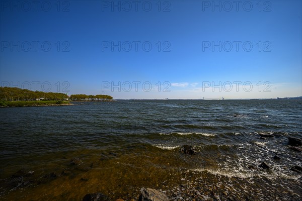 Views on New York Harbor, Manhattan and Statue of Liberty from the Liberty State Park, Jersey City,