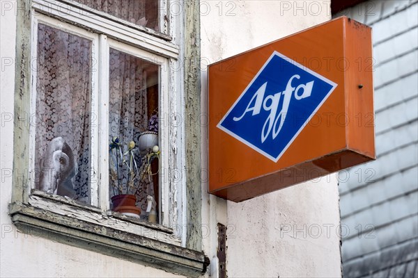Cantilever sign, AGFA Film und Foto advertising sign, light box, abandoned photo shop, old window,