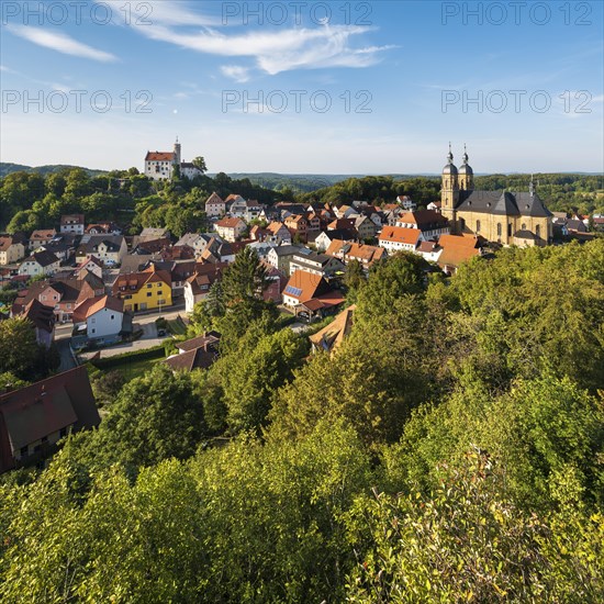 View of Goessweinstein with castle, pilgrimage church and half-timbered houses, Franconian