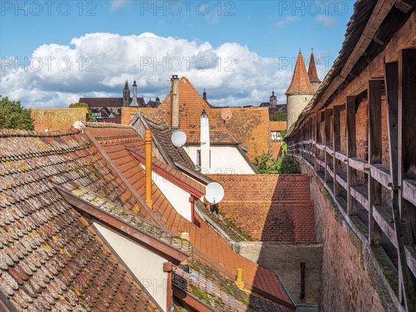 View from the battlements of the town wall to the houses and towers of the historic old town,