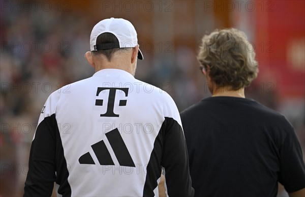 Coach Thomas Tuchel FC Bayern Munich FCB with press officer Dieter Nickles, from behind, Adidas,