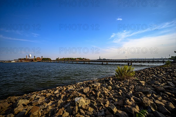 Views on New York Harbor, Manhattan and Statue of Liberty from the Liberty State Park, Jersey City,