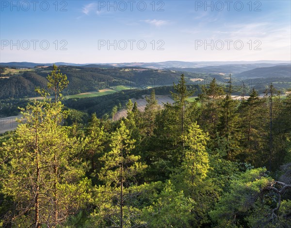 View from the shell limestone slopes near Bad Blankenburg of typical hilly landscape with forests